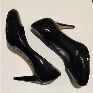 Cole Haan black patent air pumps